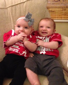 The babies in their crimson onesies from Nana and Papa